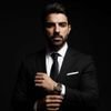 Mustafa, barber at Y&M Barbershop