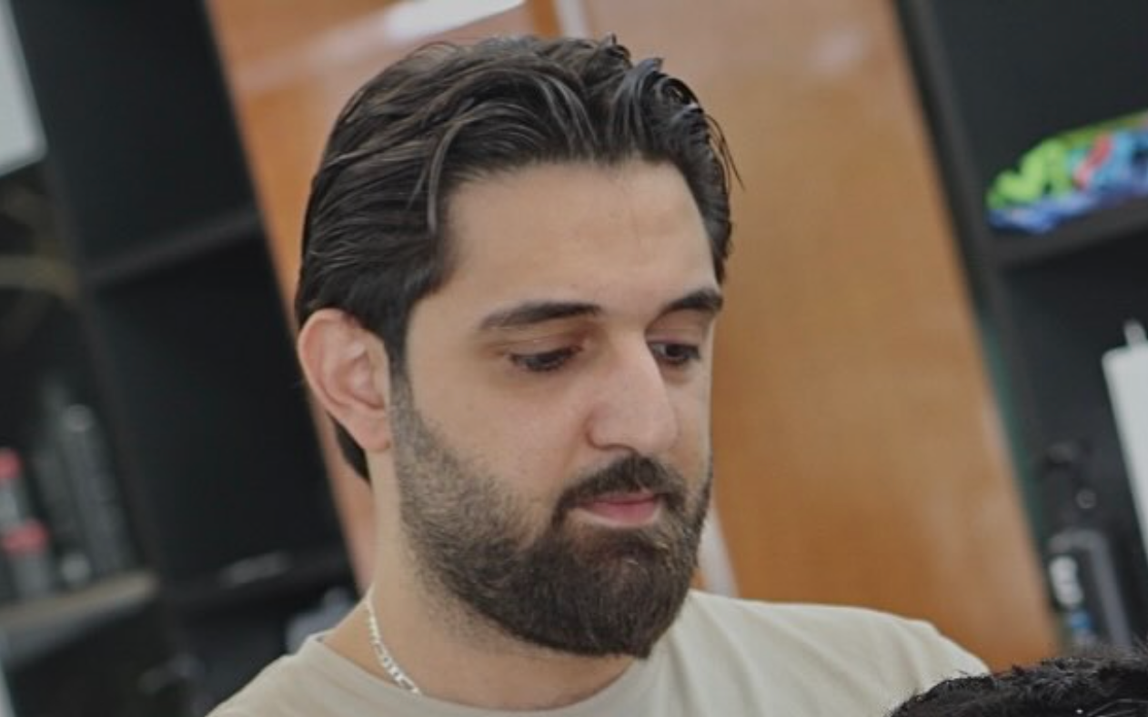Yasir, barber at Y&M Barbershop